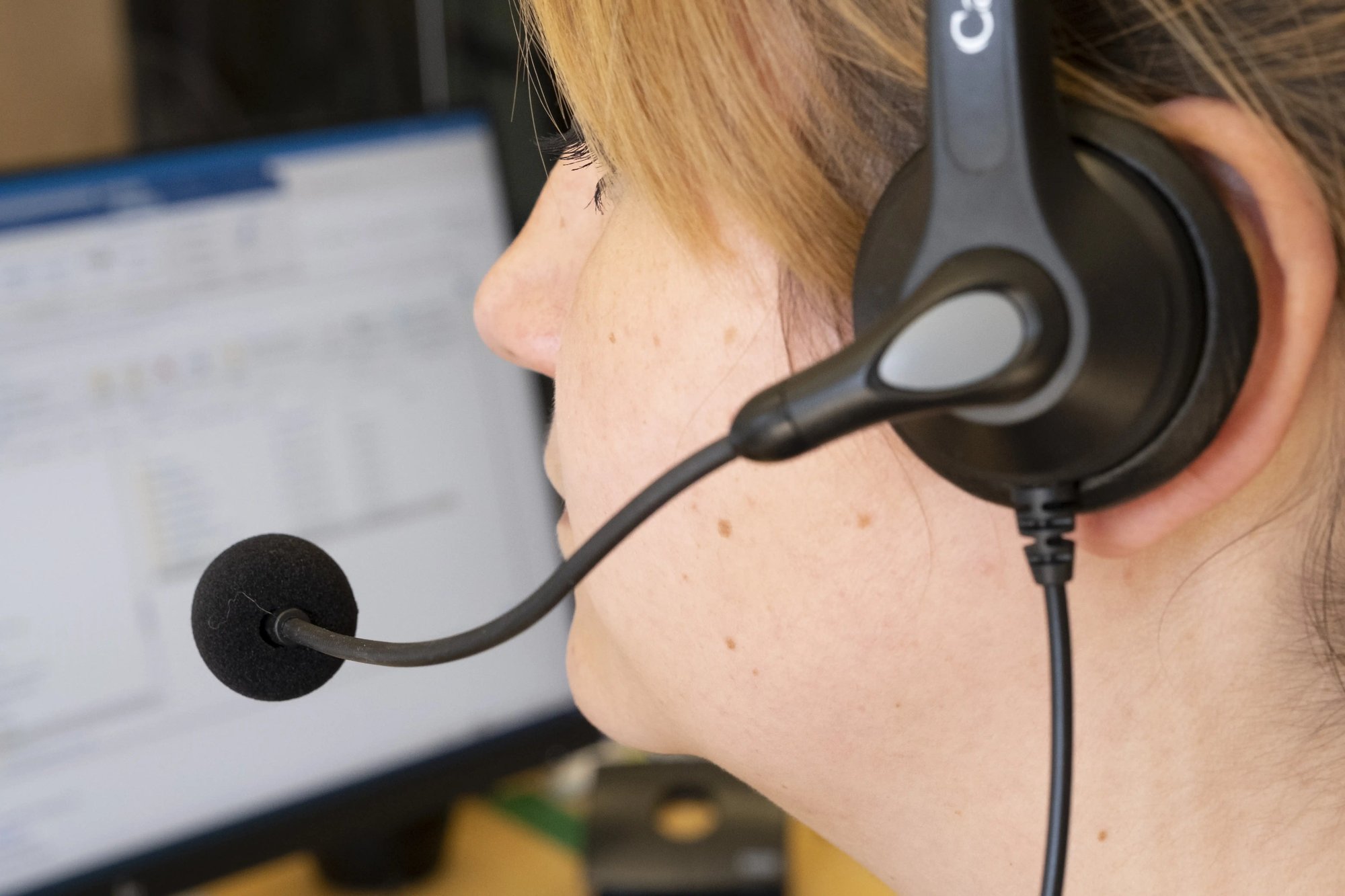 Frau mit Headset